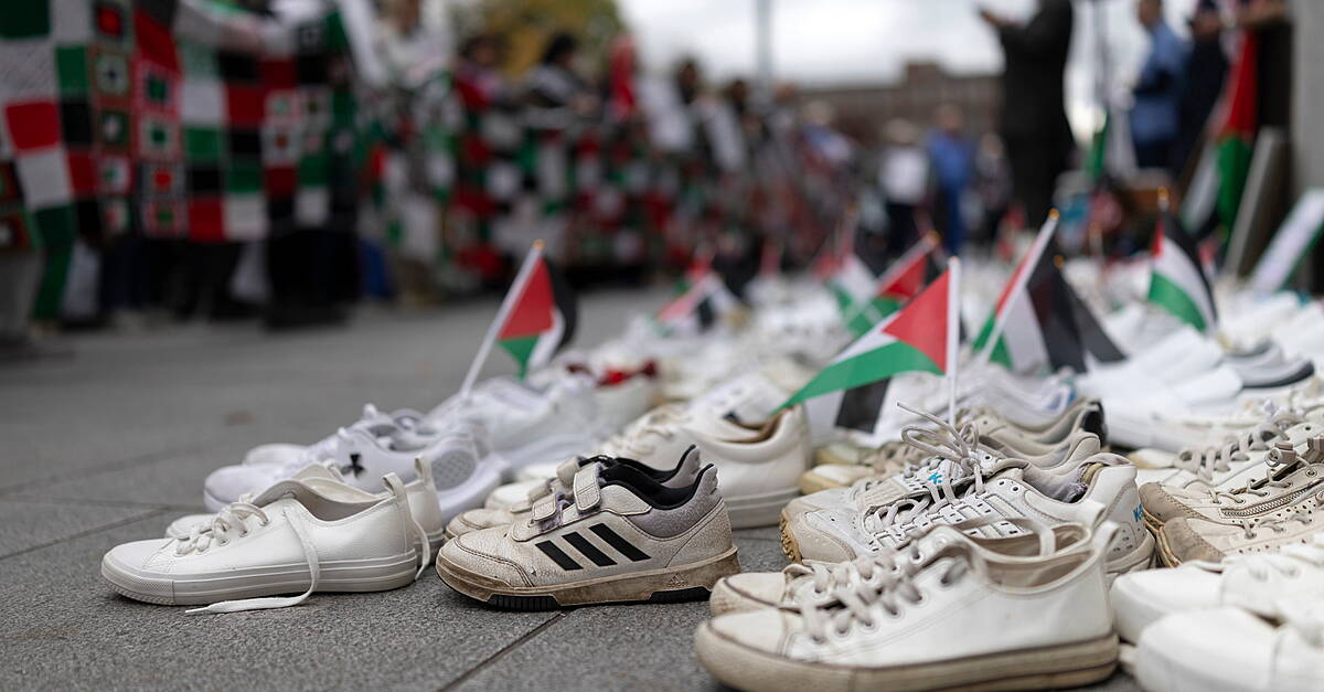 Dublin march sees dozens of assorted shoes represent healthcare workers in Gaza