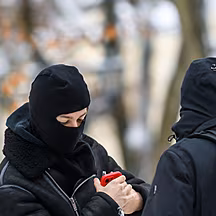 Calls for a balaclava ban in C...