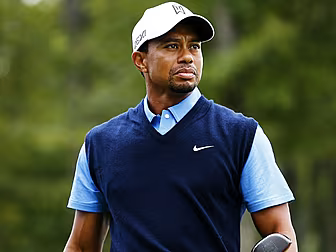 Back pain causes Tiger withdra...
