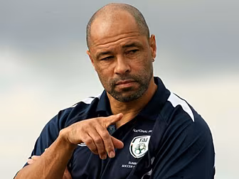 Paul McGrath isn't holding...