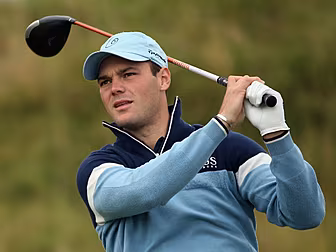 Kaymer stutters but stays on c...