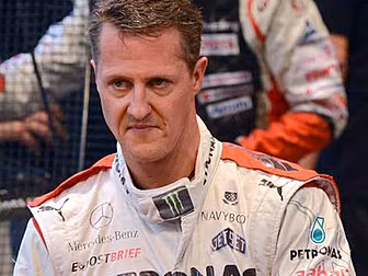 Schumacher wakes from coma