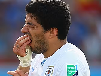 WATCH: Luis Suarez pretends to...