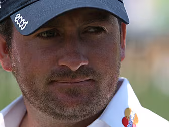McDowell shares lead after Day...