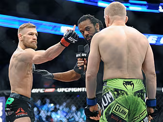McGregor walks the talk by sla...