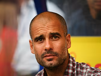 UEFA charge Guardiola over T-s...