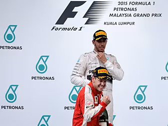Victorious Vettel and Hamilton...