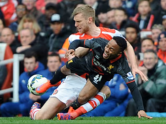 Gunners close the gap with sor...