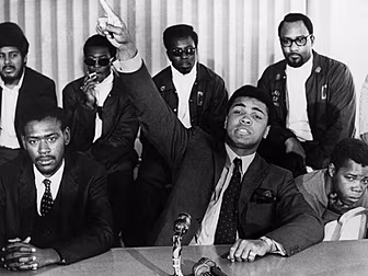 'Ali jumped off the table,...