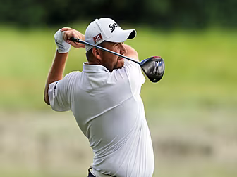 Lowry two shots off the lead a...