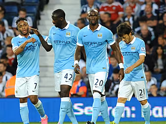 Man City flex their muscles to...