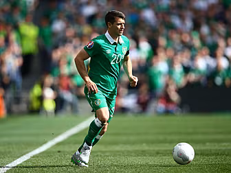"Wes Hoolahan gives the ba...