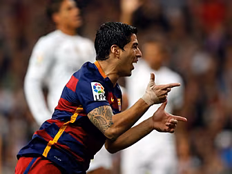 Suarez shines as Barcelona dis...