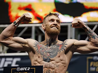 Conor McGregor beats Jose Aldo...
