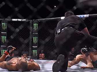 Chad Mendes comforts Jose Aldo...