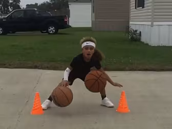A 6-year-old girl is wowing Am...