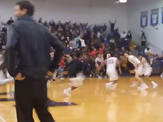 WATCH: Crowd storms the court...