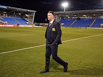 Louis van Gaal jokes with a fa...