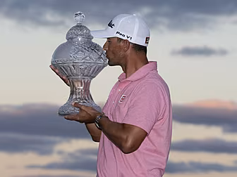Adam Scott wins for the first...