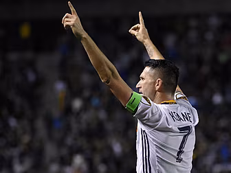 Robbie Keane falls out of the...