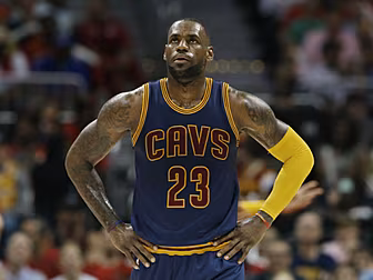 LeBron James guides the Cavali...