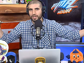 Established MMA journalist esc...