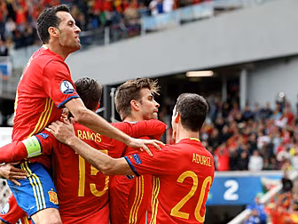 Pique heads winner as Spain...