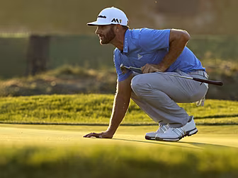 Dustin Johnson moves into the...