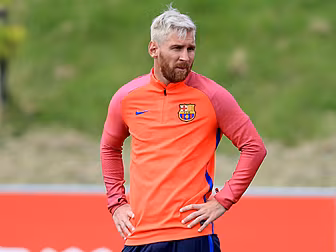 PIC: Lionel Messi is turned in...