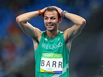 WATCH: Thomas Barr hurdles his...