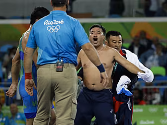 WATCH: Mongolian wrestling coa...