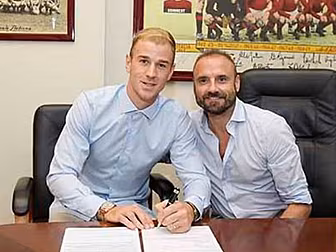 Joe Hart completes loan move t...