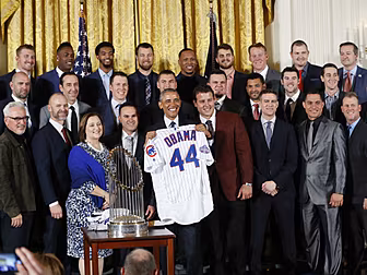 Barack Obama welcomes a sports...