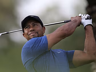 Tiger Woods feels the heat in...