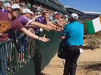 Shane Lowry distributes cans o...