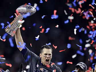 Tom Brady all smiles with Roge...