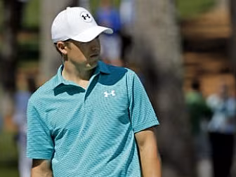 Spieth consolidates lead at Pe...