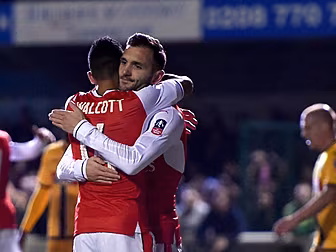 Arsenal see off battling Sutto...