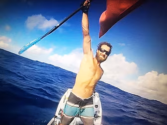 Surfer conquers Atlantic on pa...