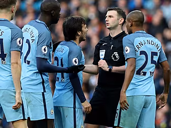 Man City fined over players co...