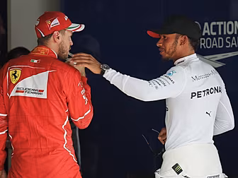 Lewis Hamilton takes pole in C...