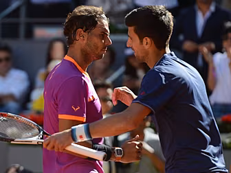 Rafa Nadal beats Djokovic to r...