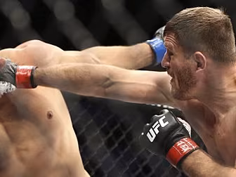 Miocic stops Dos Santos to ret...