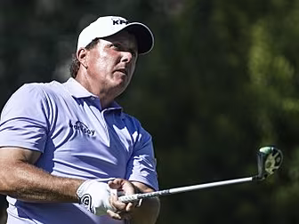 Phil Mickelson withdraws from...