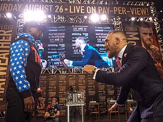 PICS: Conor McGregor taunts Fl...