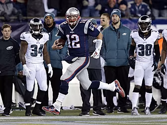 Tom Brady lines up at wide rec...