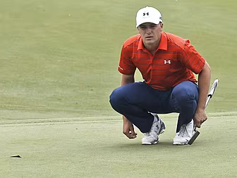 Spieth still hanging on in the...