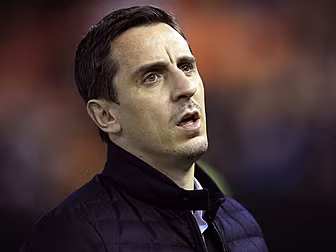 Gary Neville stands firm under...