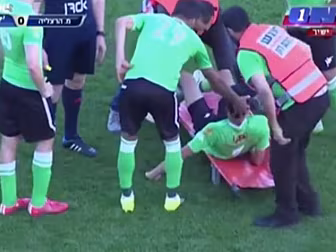 Captain carries his teammate o...