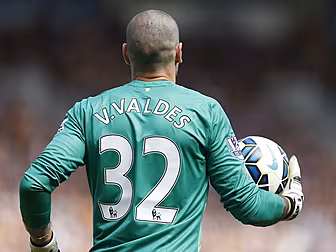 Victor Valdes' slide into...